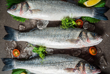Delicious fresh fish on dark  background