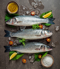 Delicious fresh fish on dark  background