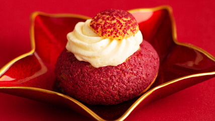 Dessert Shu cake on plate on red background
