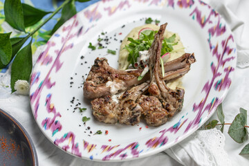 Seared Lamb Chops with Mashed Potatoes on the table at restaurant