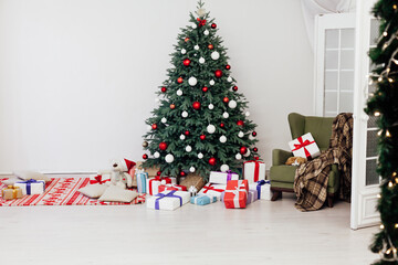 Christmas tree with gift decor for the new year winter in the white holiday card room