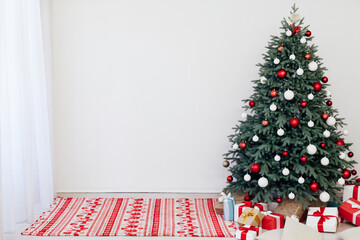 Christmas tree with gift decor for the new year winter in the white holiday card room