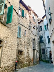 Lovely characteristic streets of Pontremoli, Italy, with old stone houses and cobblestone streets.  No people