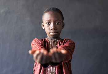 Handsome Little African Black Boy Showing Hands as a Food Request