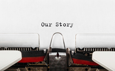 Text Our Story typed on typewriter