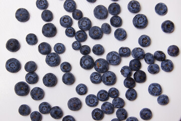 Freshly picked blueberries on white background. top view