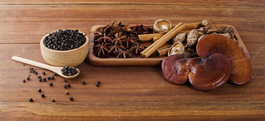 Herbs and spices on a wooden board