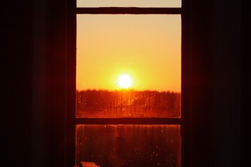 sunset though a window 