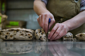 Baker making artisan bread