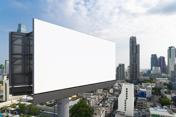 Blank white road billboard with Bangkok cityscape background at day time. Street advertising poster, mock up, 3D rendering. Side view. The concept of marketing communication to promote or sell idea.