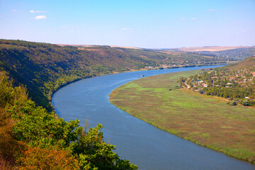Fototapeta na wymiar Moldova Dnister River Scenery . Aerial view of flowing river 
