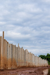 Many concrete columns prevent the river bank from eroding.