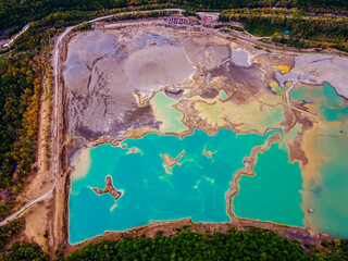 View from above. Blue waters of the former tailing dump in the village of Kavalerovo. Khrustalnensky ore mining and processing plant