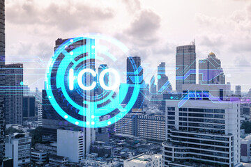 ICO icon hologram over panorama city view of Bangkok, the hub of blockchain projects in Asia. The concept of initial coin offering. Double exposure.