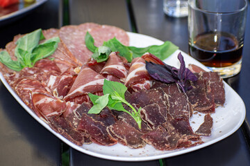 plate with cold cuts close up.