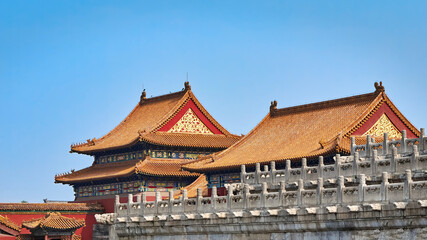 Fototapeta premium ancient chinese architecture. historic buildings against the blue sky. The Imperial Palace in Beijing (Forbidden city)