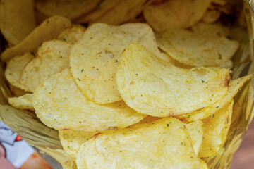 yellow potato chips in a packet close up