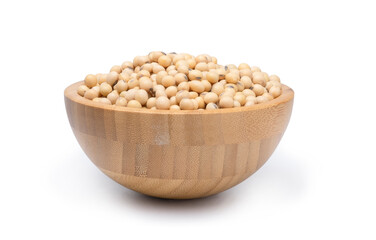 Closeup of fresh dry soybean seed in wooden bowl isolated on white background. Clipping path