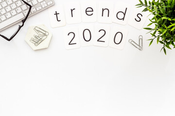 Social media trends concept with laptop. Office workplace flat lay