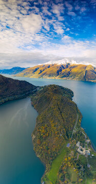 Aerial by drone of Piona Abbey (Abbazia Priorato di Piona) seen from above, Lake Como, Colico, Lecco province, Lombardy, Italian Lakes