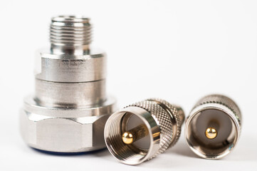 High frequency connectors component with a shiny copper nickel plating covering