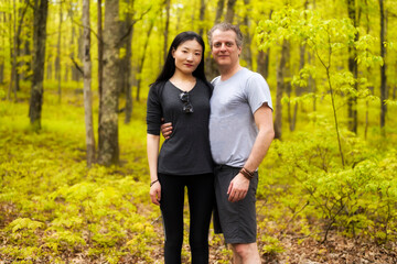 hiking couple Springtime forest