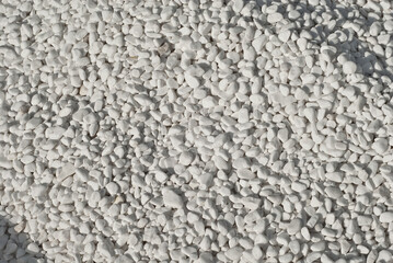 Drainage systems from small pebbles. Garden drainage for plants and trees. White stones for roads...