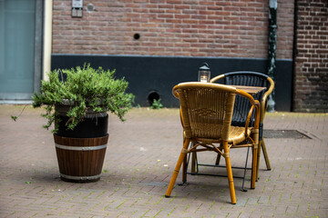 Fototapeta na wymiar sidewalk restaurant table and chair