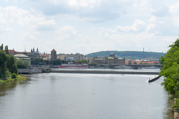 Fototapeta na wymiar view of the flowing Vltava river in the center of Prague during the day