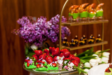 Catering, snacks with strawberries for a banquet