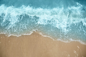 Beautiful view of sea tide on sandy beach. Summer vacation