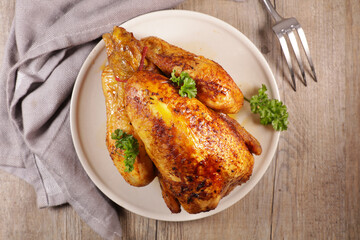 roasted whole chicken on plate