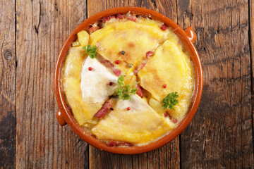 tartiflette- baked potato with bacon, cream and cheese