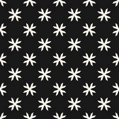 Vector geometric floral pattern. Ornamental seamless texture in ethnic style. Abstract monochrome ornament with flower shapes, crosses. Elegant black and white background. Dark repeatable design