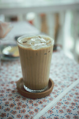 Iced latte coffee in glasses on table.