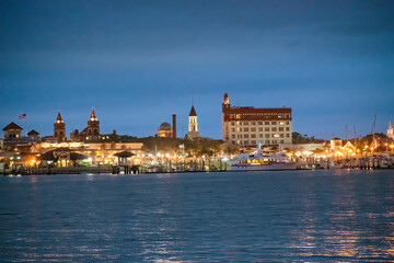 Fototapeta na wymiar St Augustine night skyline with river and buildings, Florida
