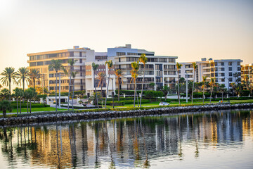 Fototapeta na wymiar Palm Beach buildings along the shoreline, Florida at sunrise