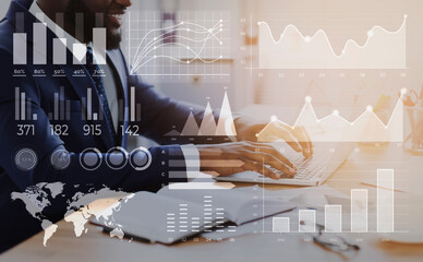 Cropped of african businessman typing on laptop