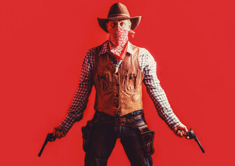 Cowboy with weapon on red background. American bandit in mask, western man with hat. Farmer or cowboy in hat. Man wearing cowboy hat, gun. West, guns - obrazy, fototapety, plakaty