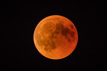 Red or blood moon, full moon eclipse in 2018. Astronomical picture of red moon in a full eclipse phase.