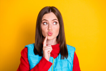 Photo of cute pretty girl look copyspace touch finger chin think thoughts guess plan season holidays wear jumper isolated over bright shine color background