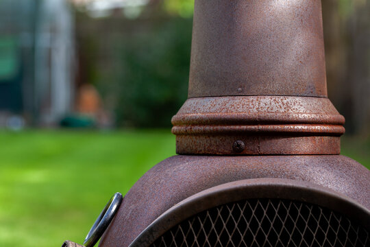 Worn Chiminea In The Garden