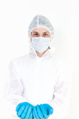 A man in a protective suit and face mask. Holds something like a bottle or jar isolated on a white background