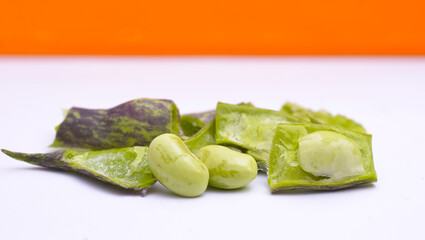 green peas on a white background