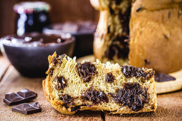 slice of panettone, with homemade chocolate chips. Typical Christmas cake, also called chocotone