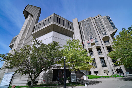   A wide angle view of Robarts Library, a fortress-like structure that is the central library of the University of Toronto.