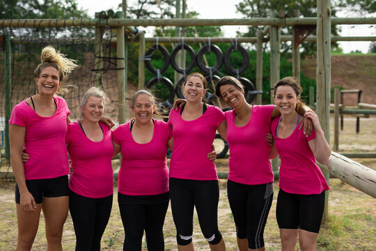 Portrait of group of woman standing together at boot camp