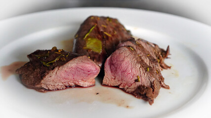 ready to eat, grilled game meat from the red deer calf