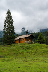 A Brother Klaus chapel in Hirschegg Austria. Auistrian Alps.
