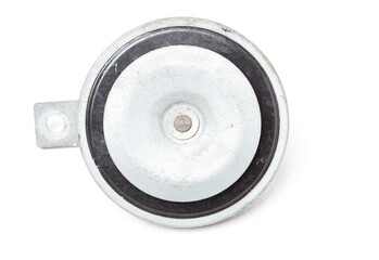 New modern electric black plastic beep - car horn on a white isolated background in a photo studio. Spare part for sale or repair in aworkshop or tuning the sound of a beep in a car service.